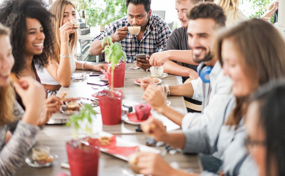 Group Of Happy Friends Drinking Coffee And Cappuccino At Vintage Bar - Young Students People Eating And Talking At Breakfast - Friendship, Trend And Food Concept - Focus On Indian Guy Face