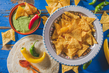 Mexican guacamole, nachos and tortilla