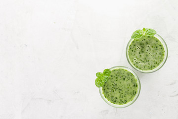 Top view of two green smoothies