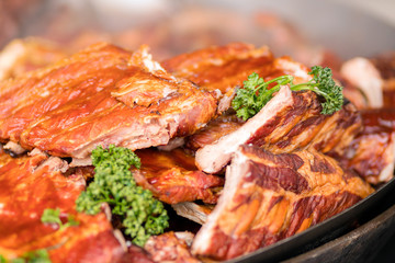 Close up macro of smoked pork meat on display for sale in city s