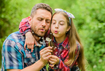 ecology. Happy family day. little girl and happy man dad. earth day. spring village country. family summer farm. daughter and father love dandelion flower. New flowers. new life concept