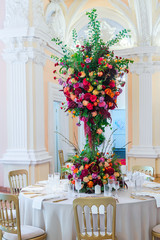 Wedding table decoration. Beautiful bouquet of flowers on the ta