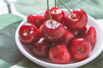 Organic Red Cherries with Fresh Water Drops as Summer Concept