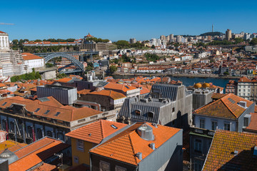 Fototapeta na wymiar Above the roofs of red tiles overlooking city of Porto, Portugal