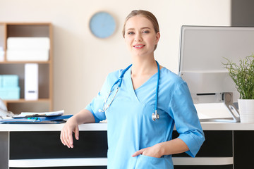 Young medical assistant in clinic