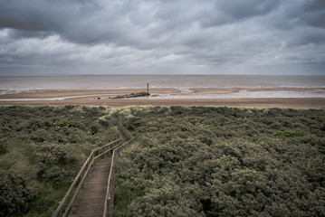 Fototapeta premium Clouds over the coast