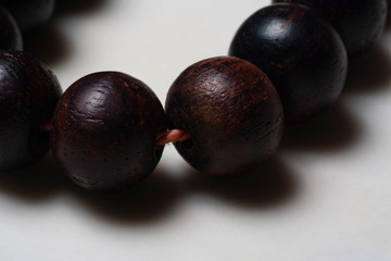 Rosary made of wood, beads, macro