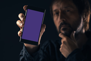 Smartphone mock up in male hand