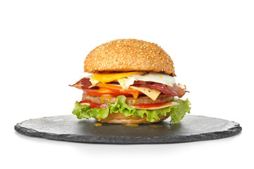 Tasty burger with bacon on white background