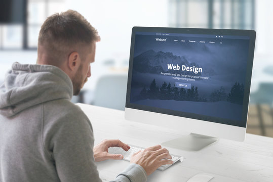 Web design studio concept with man and computer display with modern web site presentation.