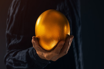 Man and golden egg