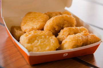 chicken nuggets in a cardboard box, food, fast food