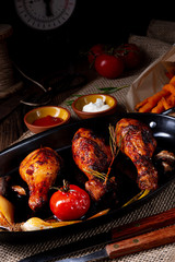 grilled chicken legs in barbecue marinade with sweet potatoes