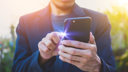 People Holding Mobile Smart Phone And Using Touch Screen on Mobile Monitor Technology Communication