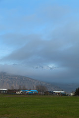 View to the small town and mountains in the fjord of Iceland