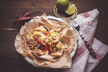 Calamari Squids with Red Hot Chili Peppers in Rustic Plate