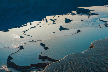 Evening landscape of Pamukkale hot springs and terraces