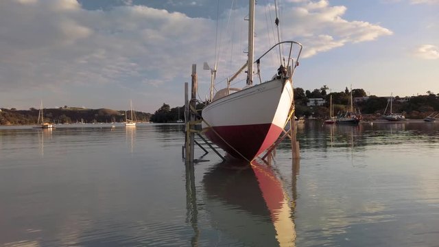 A yacht cradled in dry dock for maintenance and repair, Waiheke Island, New Zealand
