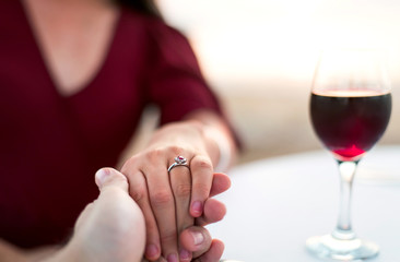Couple holding hands on a date