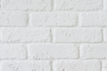Kitchen wallpaper concept: Close up modern white brick tiles wall texture background. White brick wall texture