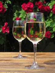 Roses in glasses is another reason for joy.               