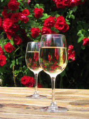 Roses in glasses is another reason for joy.               