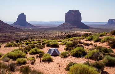 Morning in the Monument Valley. Tourist tents amid the crumbling rocks of Arizona