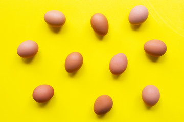 Eggs on yellow background.