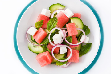 Watermelon salad with feta cheese isolated on white background