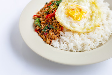Rice topped with stir-fried pork with basil and fried egg
