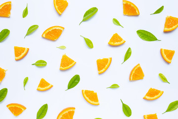  Fresh orange fruit with green leaves for background.