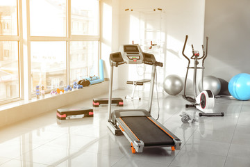 Interior of gym with modern equipment