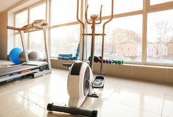 Interior of gym with modern equipment