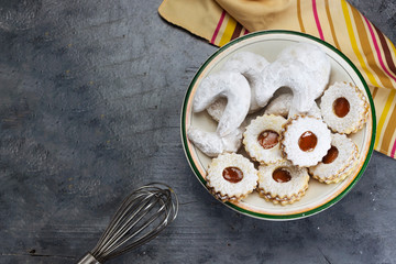 Oriental Algerian sweet cookies( kaab el ghazal) translated in gazelle horns name and cookies with apricot jam