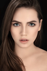 Fototapeta premium Serious amazing model looking at camera