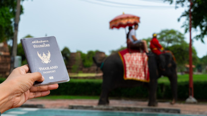 Traveler holding Thailand passport in Ayutthaya Province Thailand