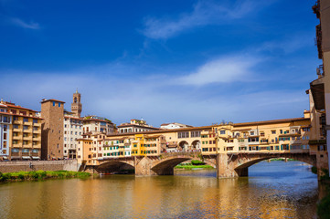 View of the famous Ponte Vecchio (Old Bridge) over River Arno in the historic center of Florence