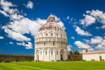 The Pisa Baptistery of St. John in Square of Miracles at sunny day, Tuscany region, Italy.