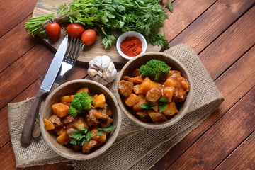 Traditional homemade Hungarian beef meat stew, Goulash with potatoes, carrots , tomatoes, broccoli in a bowl