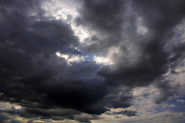 Dark big grey storm clouds. Dramatic sky.