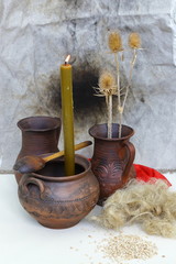 An amulet of dolls holding an angel from hay and a dry flower of handmade. Dry shoots, wheat, rye....