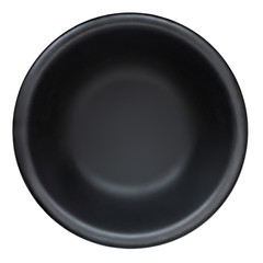 Black plate isolated on white background. Top view of empty Round stone  plate