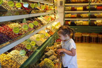 girl child at counter with Turkish tea