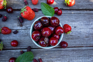 juicy fresh tasty berries - strawberries, stem, mulberry