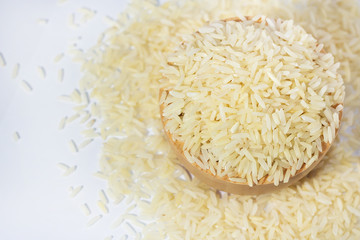 Closeup of rice seeds in wooden bowl