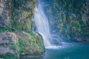 Fototapeta na wymiar Waterfall landscape in Muel Zaragoza Spain