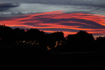 Fototapeta premium Beautiful pink cloud over the Zaragoza Skt