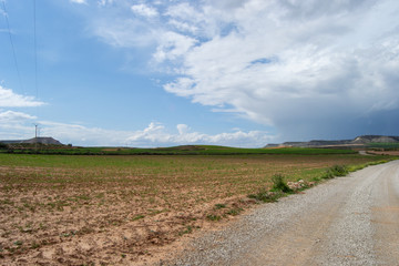 Beautiful storm landscape surroundings of Zaragoza rain rainbow and horizon hills