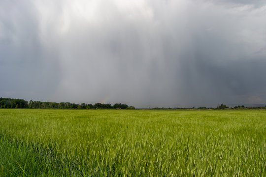 Beautiful storm landscape surroundings of Zaragoza rain rainbow and horizon hills © Maria