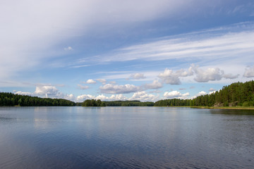 Fototapeta na wymiar Beautiful landscape at Kuopio full of water at sunset